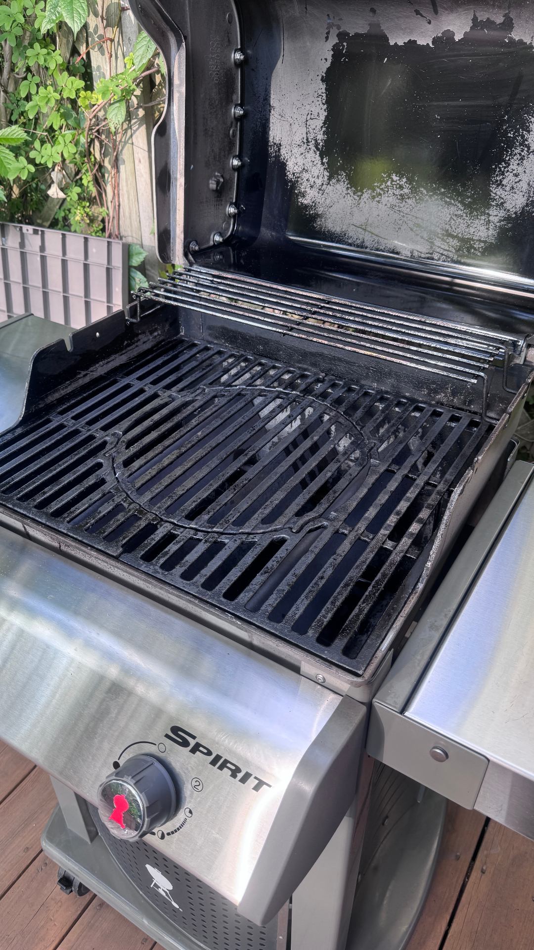 Restored cast iron grates and clean firebox on a Weber Spirit gas grill after a Campbell Grill Detail service in the Chicago North Shore.